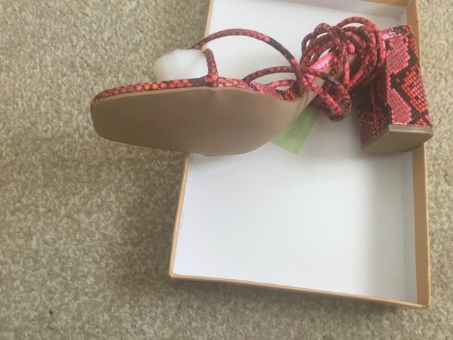 Pink snake sandals